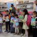 فرحة الأطفال في معرض الكتاب