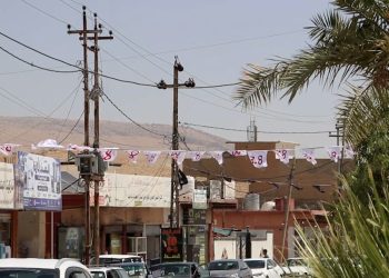 Li navenda Şengalê pankartên ”3.8” Tebaxê hatin hildan